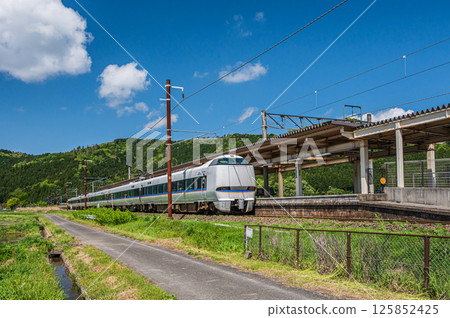 Limited express train passing Yogo Station on the Hokuriku Main Line, Yogo Town, Nagahama City, Shiga Prefecture Limited express train passing Yogo Station on the Hokuriku Main Line, Yogo Town, Nagahama City, Shiga Prefecture 125852425