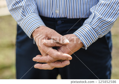 The hands of a pensioner. Old hands. The hands of a pensioner. Old hands. 125852586