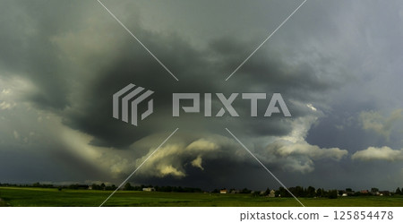 Photogenic mothership supercell storm which had taken on the appearance of a 'cinnamon bun' just outside Harrisburg, Nebraska and from which multiple tornadoes were reported. 125854478