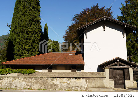 House with Red Roof and Tall Cypress Trees House with Red Roof and Tall Cypress Trees 125854523