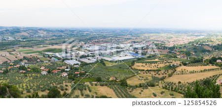 Scenic panorama of italian countryside with rolling hills and villages in Verucchio, Italy 125854526