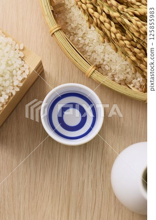 Sake poured into Ochoko Sake poured into Ochoko 125855983