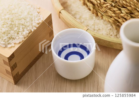 Sake poured into Ochoko 125855984