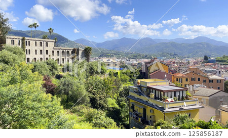 Villa Gualino on hill on sunny day. Liguria and an old traditional building. Sestri Levante - town on sea coast. Tourism and recreation. 125856187