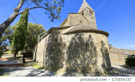 Sestri Levante, Genova, Liguria - 26.04.2025. Old stone church of Saint Nicholas on mountain on sunny day. Traditional old building. Town by sea. Sestri Levante, Genova, Liguria - 26.04.2025. Old stone church of Saint Nicholas on mountain on sunny day. Traditional old building. Town by sea. 125856197