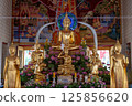 Nonthaburi, Thailand, March 15, 2025, Inside Wat Chimphli Sutthawat showcasing ornate decorations and golden statues in a serene atmosphere 125856620