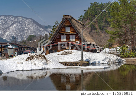 Snow melts in Shirakawa-go Gassho-style houses Snow melts in Shirakawa-go Gassho-style houses 125856931