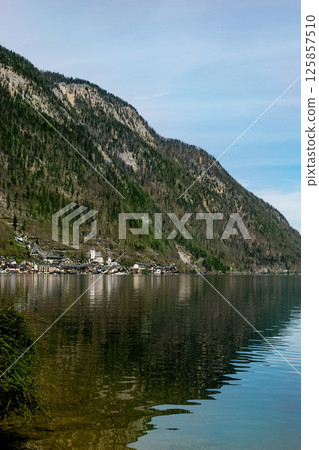 Hallstatt Austria. Alpine Lake Village Mountain Reflection Hallstatt Austria. Alpine Lake Village Mountain Reflection 125857510