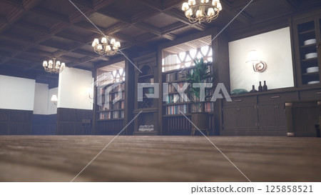 Empty vintage library with wooden bookshelves in old house furnished with chandeliers. Refined home environment with potted plant and antique shelves filled with vintage hardcover books 125858521