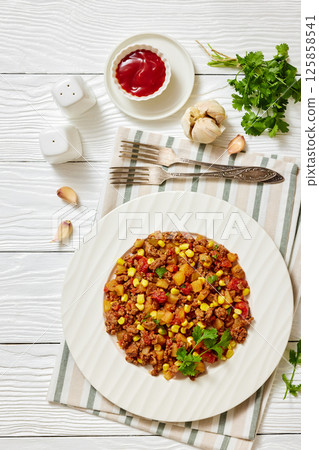 ground beef stew of potatoes and chopped tomatoes ground beef stew of potatoes and chopped tomatoes 125858541