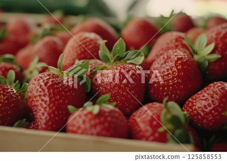 The strawberries in a rustic wooden box The strawberries in a rustic wooden box 125858553