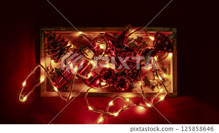 Christmas tree decorations and glowing lights Christmas tree decorations and glowing lights 125858646