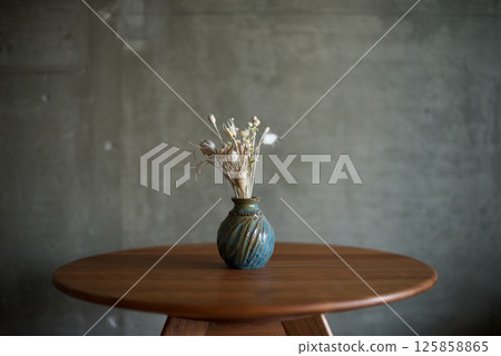 dried flowers in a blue vase 125858865