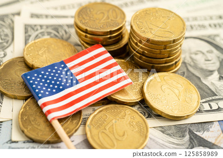 US America flag on coin and banknote money, finance trading investment business currency. US America flag on coin and banknote money, finance trading investment business currency. 125858989