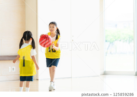 kids playing basketball kids playing basketball 125859286