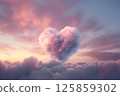 A giant heart shaped cloud made of fluffy pastel. Cloud heart shape sign. Big pink heartshaped fluffy cloud. 125859302