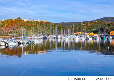Unbelivable Yachts at Castelsardo  port . Mediterranean seascape. 125860152