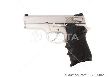 Pistol isolated over white background. Exemplar of firearm weapon 125860640
