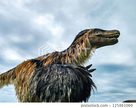 Feathered T-Rex and Dinosaurs in Summer Vacation Park 125861060