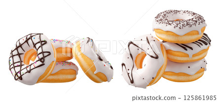 Donuts with white chocolate glaze, sprinkles, white drizzle, and dots isolated on white transparent background Donuts with white chocolate glaze, sprinkles, white drizzle, and dots isolated on white transparent background 125861985