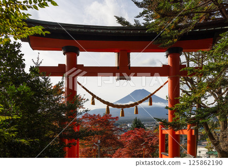 Mount Fuji with autumn foliage and greenery surrounding Shiogama Shrine in Arakura Fujiyoshida 125862190