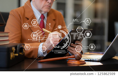 Lawyer singing in documents, filling court records, job responsibilities in office. Lawyer singing in documents, filling court records, job responsibilities in office. 125862509