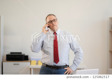 Businessman using laptop computer in office. success man, entrepreneur, small business owner working online. 125862517
