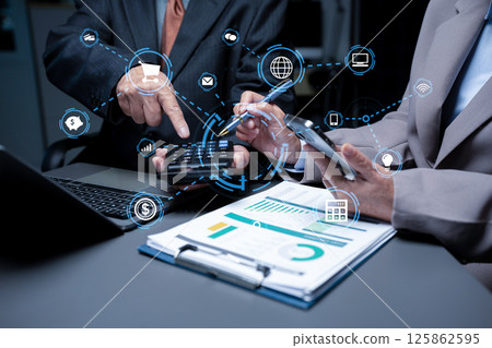 Co-workers are consultants on business documents, tax, transactions and business combinations after a bankrupt merger with a newly founded company. 125862595