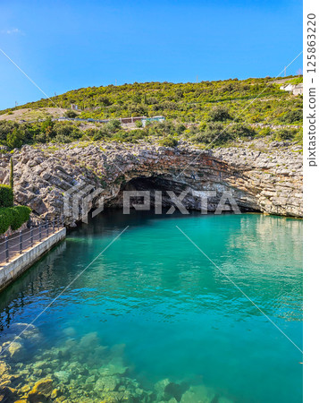 Sea Cave in Lustica Bay, Montenegro Sea Cave in Lustica Bay, Montenegro 125863220