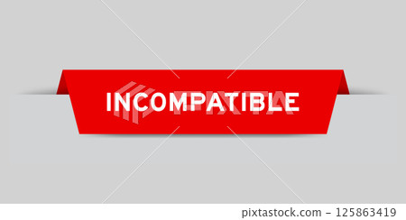 Red color inserted label with word incompatible on gray background 125863419