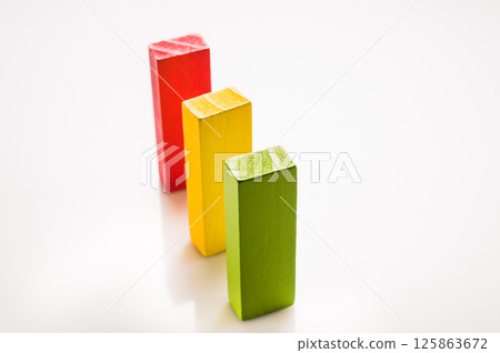 Wooden blocks as educational toys provide engaging play with a learning effect. Modules of different colors promote motor skill development. Wooden blocks as educational toys provide engaging play with a learning effect. Modules of different colors promote motor skill development. 125863672
