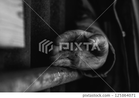 The palm of a man's hand. A dirty,  125864071