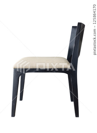 Side view of a wooden chair with a comfortable fabric seat, isolated on a white background Side view of a wooden chair with a comfortable fabric seat, isolated on a white background 125864170
