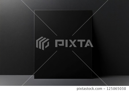 Blank black paper mockup against textured dark background. Professional, minimalistic layout. Ideal for branding, business identity, presentation design, modern art posters, and visual concepts 125865038