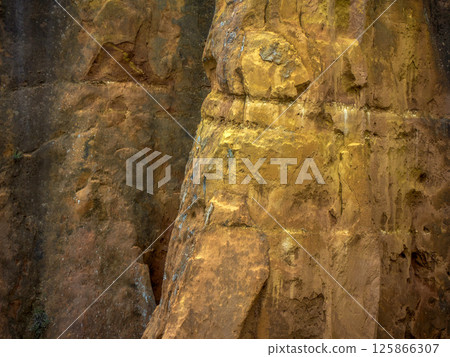 Detail of colored rocks in Ocher canyon valley massif in Provence france Rousillon area Detail of colored rocks in Ocher canyon valley massif in Provence france Rousillon area 125866307