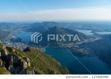 Panoramic view of lakes and surrounding mountains near town of Lecco Panoramic view of lakes and surrounding mountains near town of Lecco 125866996