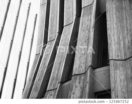 Cement concrete wall line pattern Building facade Grey texture Architecture details 125867252