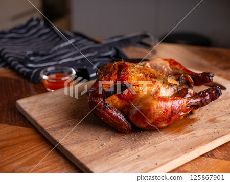 Crispy Roasted Whole Chicken Close-Up. Crispy Roasted Whole Chicken Close-Up. 125867901