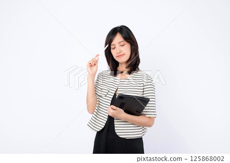 Southeast asian woman is small business owner thinking creatively about her retail startup using online store in creative industry for shopping success and growth Southeast asian woman is small business owner thinking creatively about her retail startup using online store in creative industry for shopping success and growth 125868002