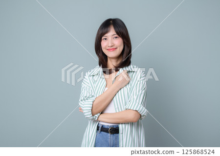 Southeast asian woman smiles confidently as small business owner in retail and online store industry showing creative spirit for her startup and shopping success Southeast asian woman smiles confidently as small business owner in retail and online store industry showing creative spirit for her startup and shopping success 125868524