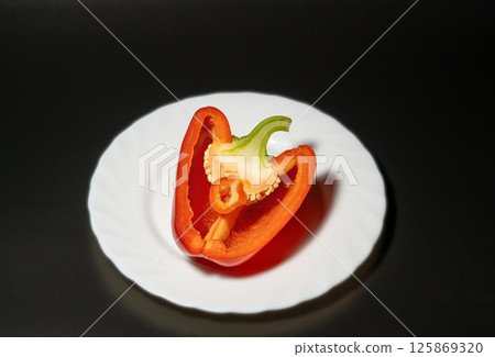 Bell pepper on a black background Bell pepper on a black background 125869320