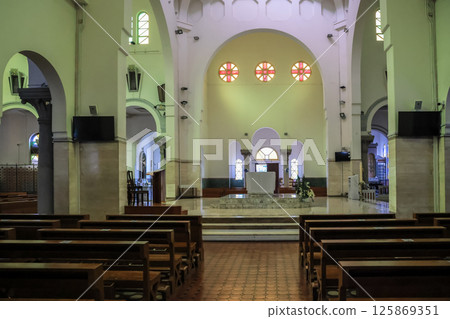 May 5 2025 View of a Church with Arched Architecture and Stained Glass Windows May 5 2025 View of a Church with Arched Architecture and Stained Glass Windows 125869351