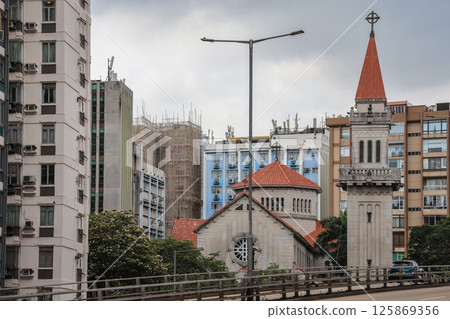 May 5 2025 Historic Church Building with Tree-Lined Grounds and Clear Sky May 5 2025 Historic Church Building with Tree-Lined Grounds and Clear Sky 125869356