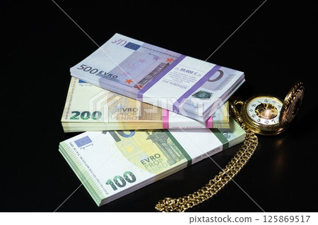 Euros in bundles Euros in bundles 125869517