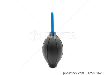 A manual air blower. Rubber air blower for cleaning dust from the camera and lens. Isolated on white 125869629