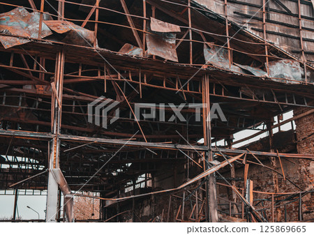 Ruins of a building after fire. Ruins after fire disaster, loss and despair concept Ruins of a building after fire. Ruins after fire disaster, loss and despair concept 125869665