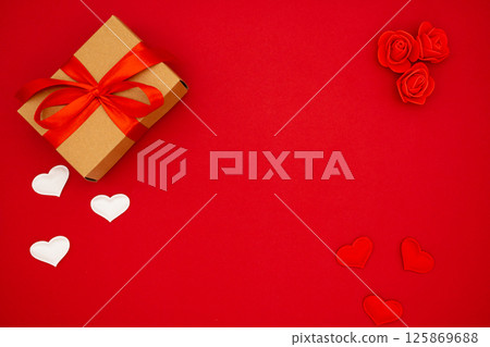 Beautiful gift box and hearts. Banner, flyer, beautiful postcard. The concept of holidays and love 125869688