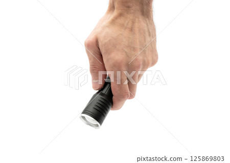 Hand holding flashlight isolated on white background 125869803