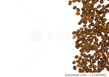 Brown coffee beans scattered on white with a lot copy space for text 125869805