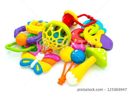 Baby toys collection, tooth toys, rattles isolated on white background Baby toys collection, tooth toys, rattles isolated on white background 125869947